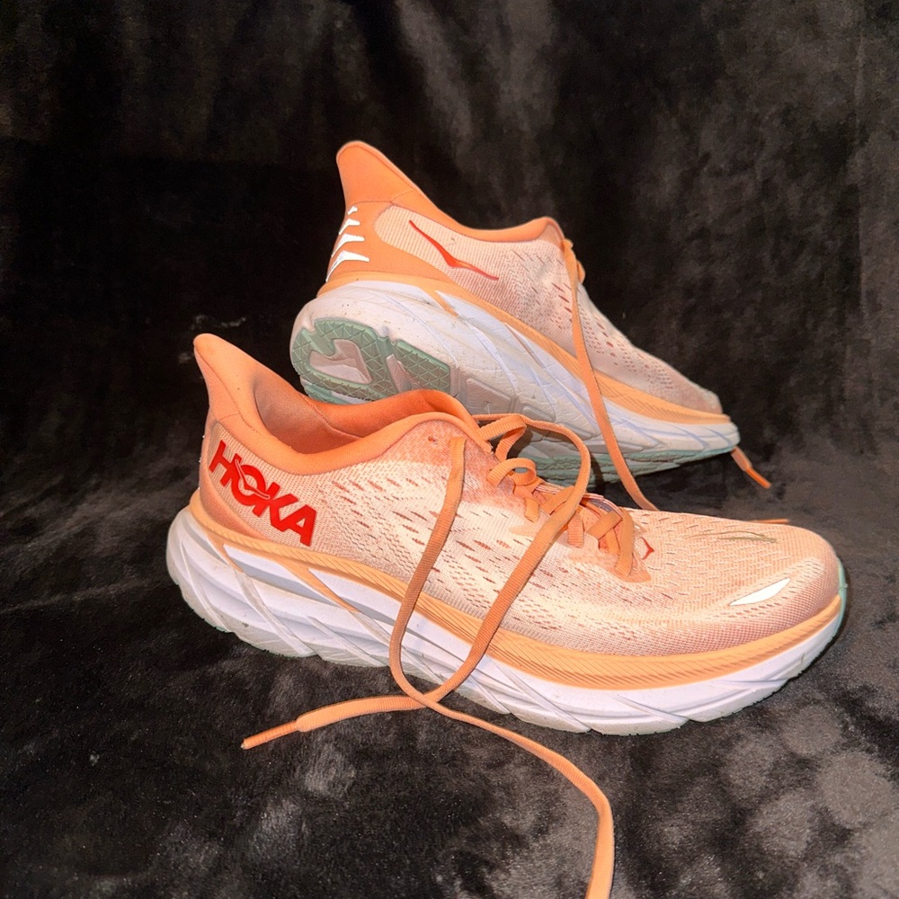 Hoka Clifton 8 running shoes / cantaloupe & silver peony color